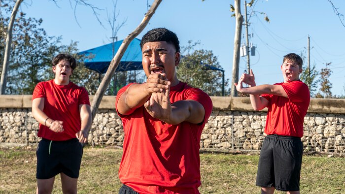U.S. Marine Corps poolees with Recruiting Station Houston, 8th Marine Corps District, conduct cool-down exercises during a poolee function with Marines at Gene Green Dog Park in Houston, Texas, Jan. 11, 2025. The poolees competed in teams throughout the day conducting pull-ups, a relay race, a simulated-resupply run, and a tug-of-war. (U.S. Marine Corps photo by Sgt. Ryan H. Pulliam)