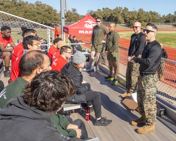 U.S. Marine Corps Gunnery Sgt. Peter R. Hager , a recruiter with Recruiting Sub-Station Round Rock, Recruiting Station Austin, speaks to Poolees during a Initial Strength Test at Williamson County Regional Park in Leander, Texas, Jan. 11, 2025. The IST is a baseline-fitness test for the new recruits to ensure they meet the physical requirements to begin the 13-week transformation to earn the title United States Marine. (U.S. Marine Corps photo by Cpl. Jose D. Cruz)