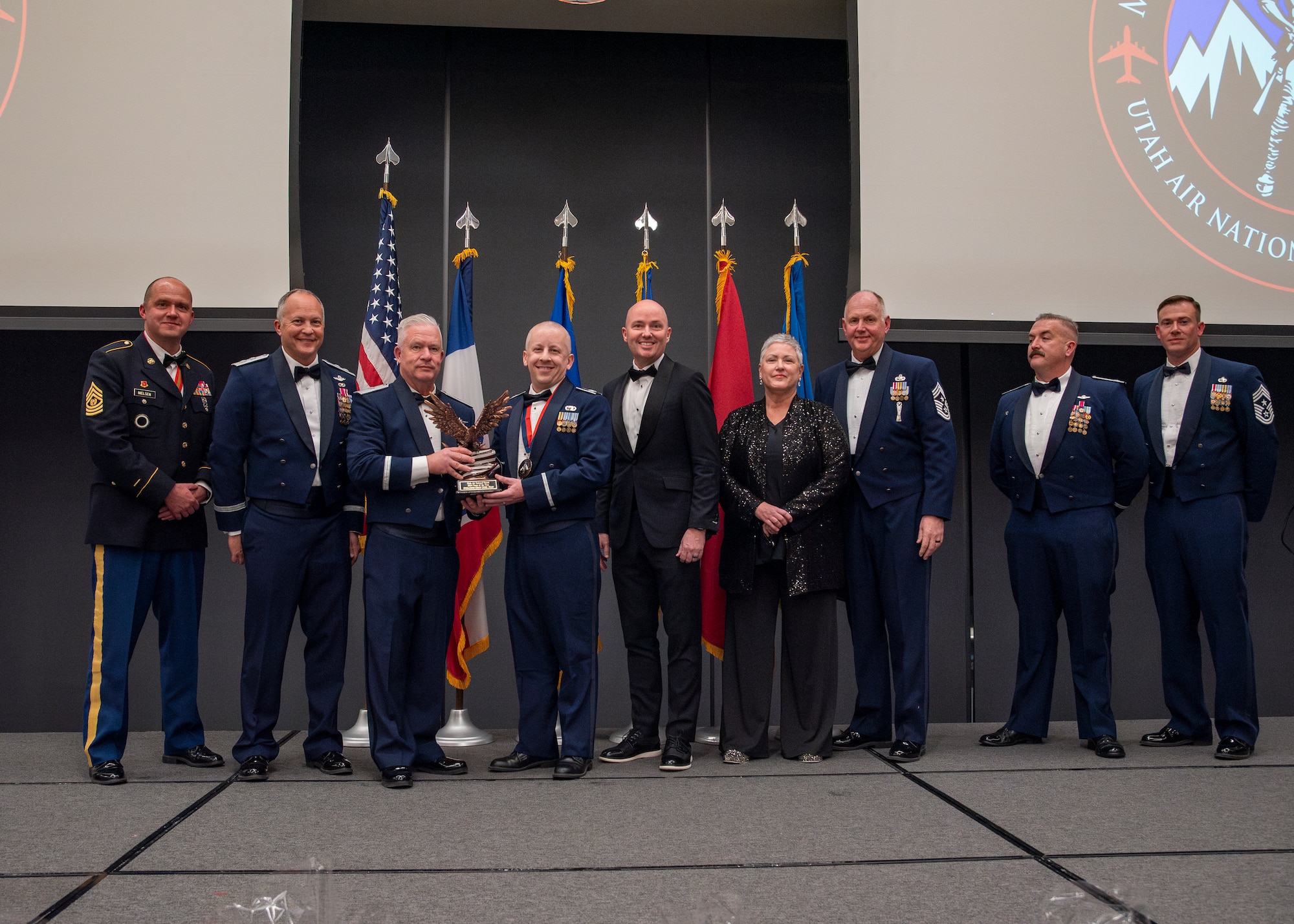 Winners of the 2024 Utah Air National Guard Airmen of the Year awards pose for a group photo following the award banquet held Jan. 11, 2025, in Midvale Utah. These Airmen are recognized for exceptional job performance, leadership and personal achievements.