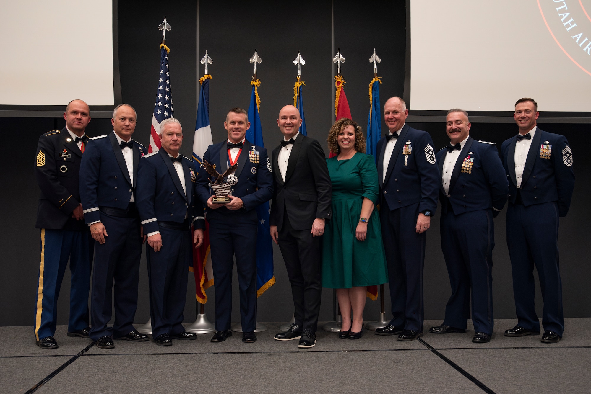 The Outstanding Senior Non-Commissioned Officer of the Year is presented to MSgt. Christopher Cook from the 151st Mission Support Group during the 2025 Airmen of the Year banquet on Jan. 11, 2025, in Midvale, Utah. The Airmen of the Year award program recognizes Airmen who display superior leadership, job performance, and personal achievement.