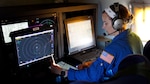 “I never set out wanting to fly into storms or chase hurricanes,” said Navy Reserve Lt. Kerri Englert. But speaking from inside an airplane hangar overlooking a dark blue propeller plane adorned with oddly shaped instruments, the leap of faith appears to have paid off. From high school Navy JROTC to serving as a Navy Reserve Meteorology and Oceanography (METOC) officer and now one of a handful of flight directors for the fabled National Oceanic and Atmospheric Administration (NOAA) Hurricane Hunters, Englert has charted her path with an adventurous spirit and a willingness to ask herself: “Why not?”