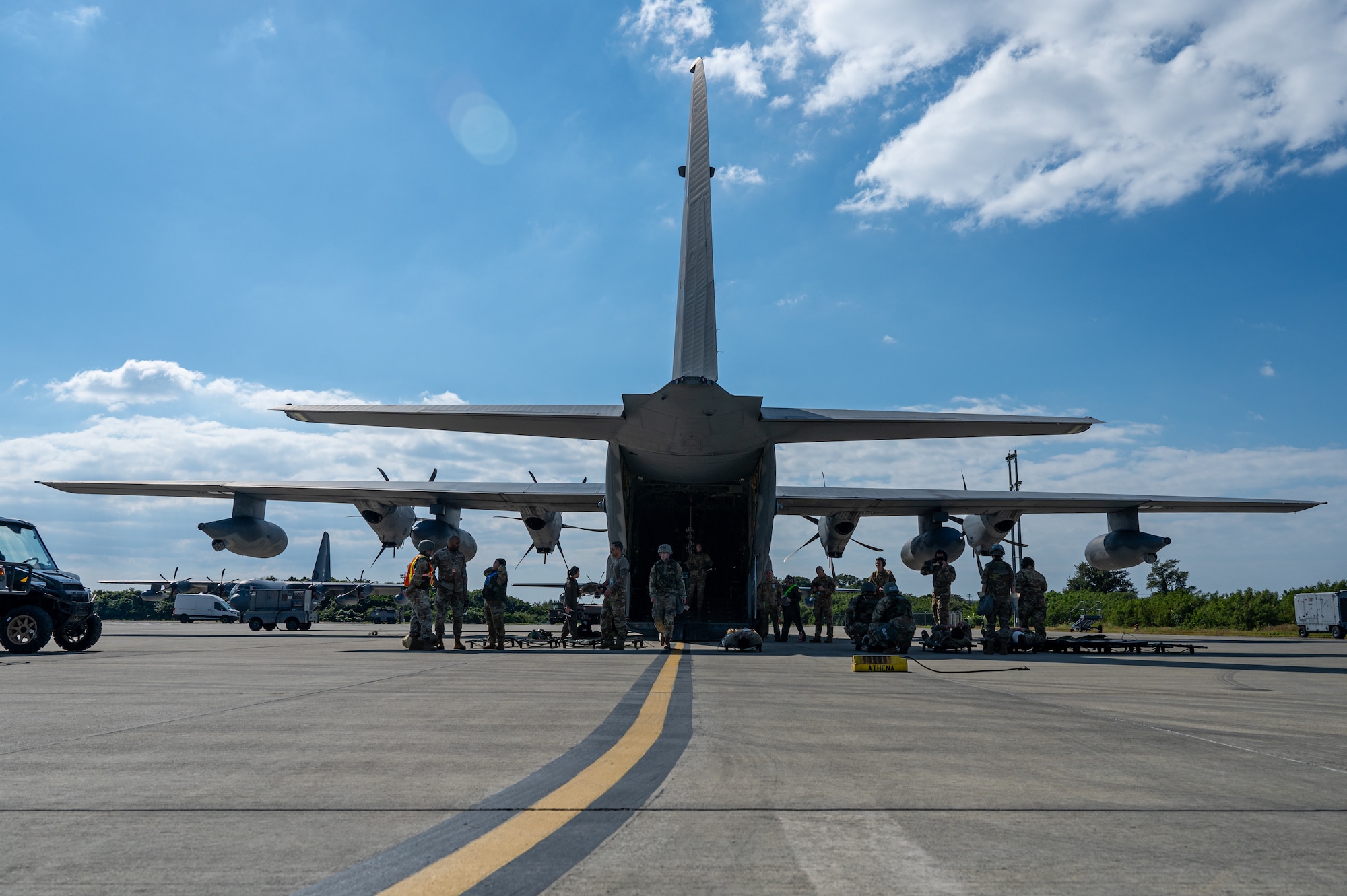 U.S. Air Force Airmen with the 18th Medical Group and the 18th Aeromedical Evacuation Squadron transfer simulated patients during a mass casualty scenario during a routine readiness exercise at Kadena Air Base, Japan, Jan. 14, 2025.