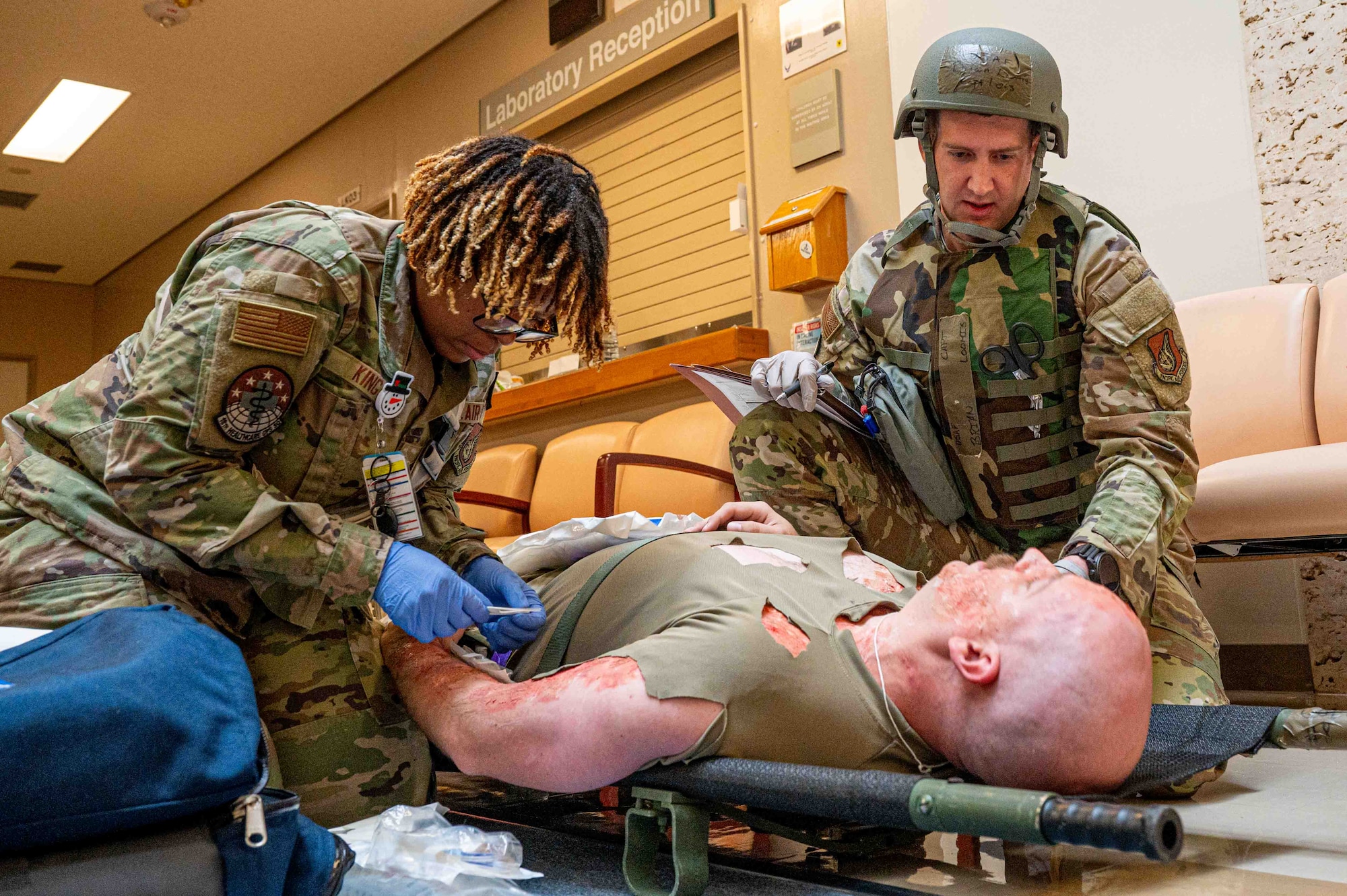 U.S. Air Force Airmen with the 18th Medical Group treat a simulated patient during a mass casualty scenario in support of a routine readiness exercise at Kadena Air Base, Japan, Jan. 14, 2025.