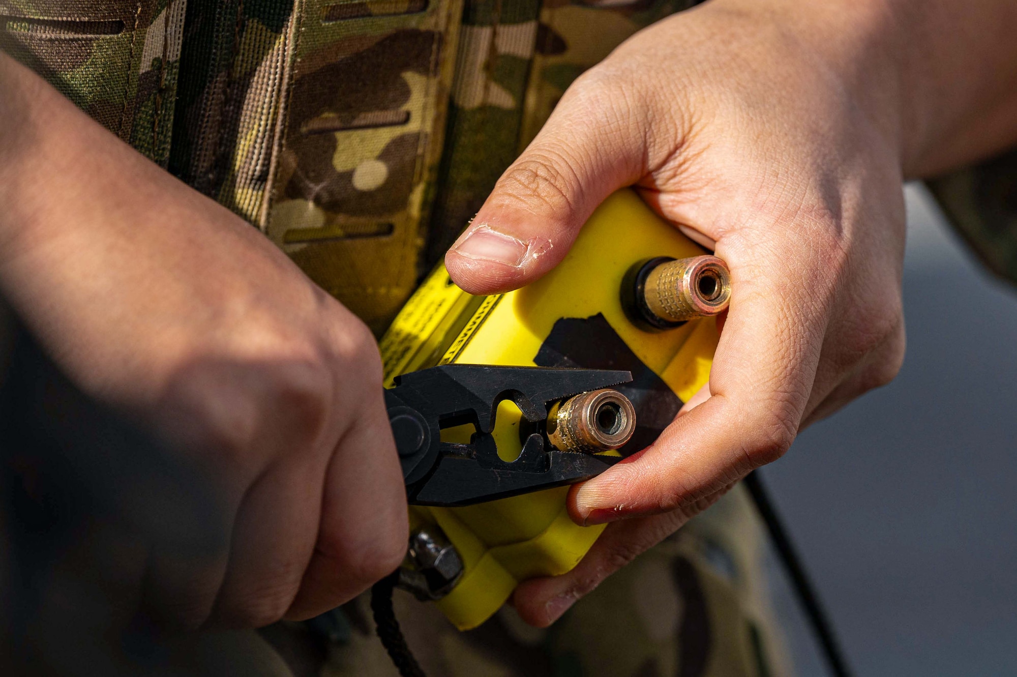 A U.S. Air Force Explosive Ordnance Disposal technician with the 18th Civil Engineer Squadron, prepares to neutralize unexploded ordnance during an emergency rapid response exercise at Kadena Air Base, Japan, Jan. 14, 2025.