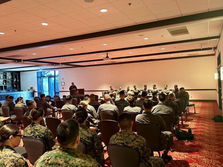 A panel of U.S. Marine Corps Reserve officers speak to officers with the 3rd Marine Aircraft Wing about their experiences transitioning from active duty to reserve squadrons, balancing civilian careers, family responsibilities, and service, at the Marine Corps Air Station Miramar Officers Club, Jan. 10, 2025.