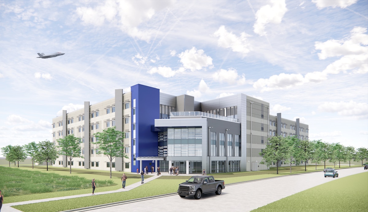 A graphic showing the future Airmen dorm facility at Tyndall, which showcases a grey, large building with an accent, blue wall.