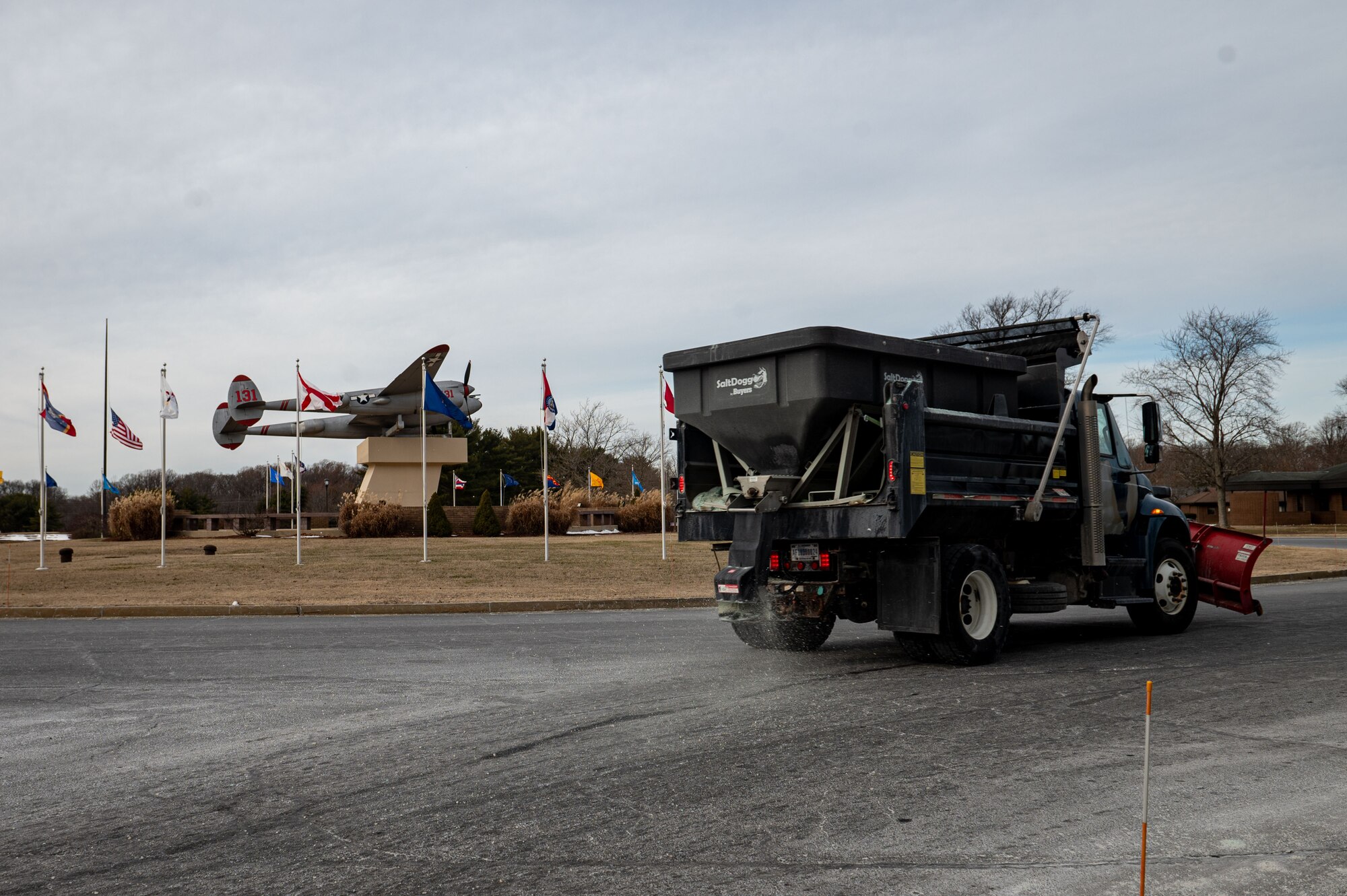 The Pudgy roundabout   is treated with salt prior to a snow event at Joint Base McGuire-Dix-Lakehurst, N.J., Jan. 10, 2025. The 87th Civil Engineer Squadron pretreats and salts airfields, roads and parking areas around JB MDL during the winter season. (U.S. Air Force photo by Jewaun McElroy)