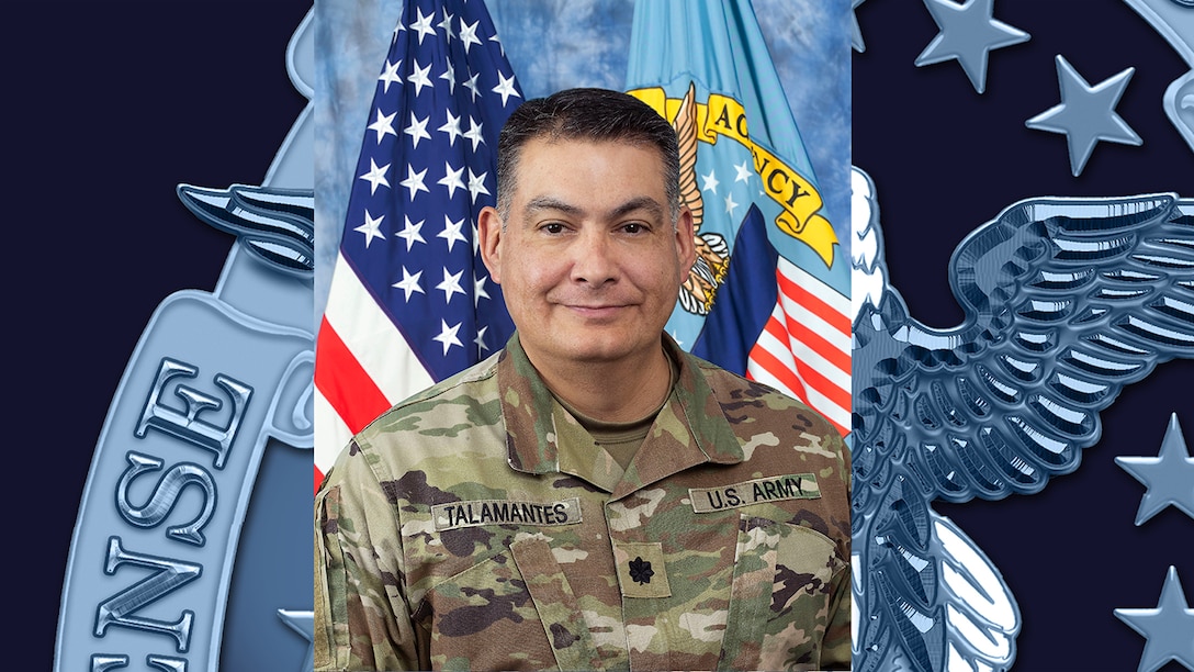 An official portrait of a man in uniform.