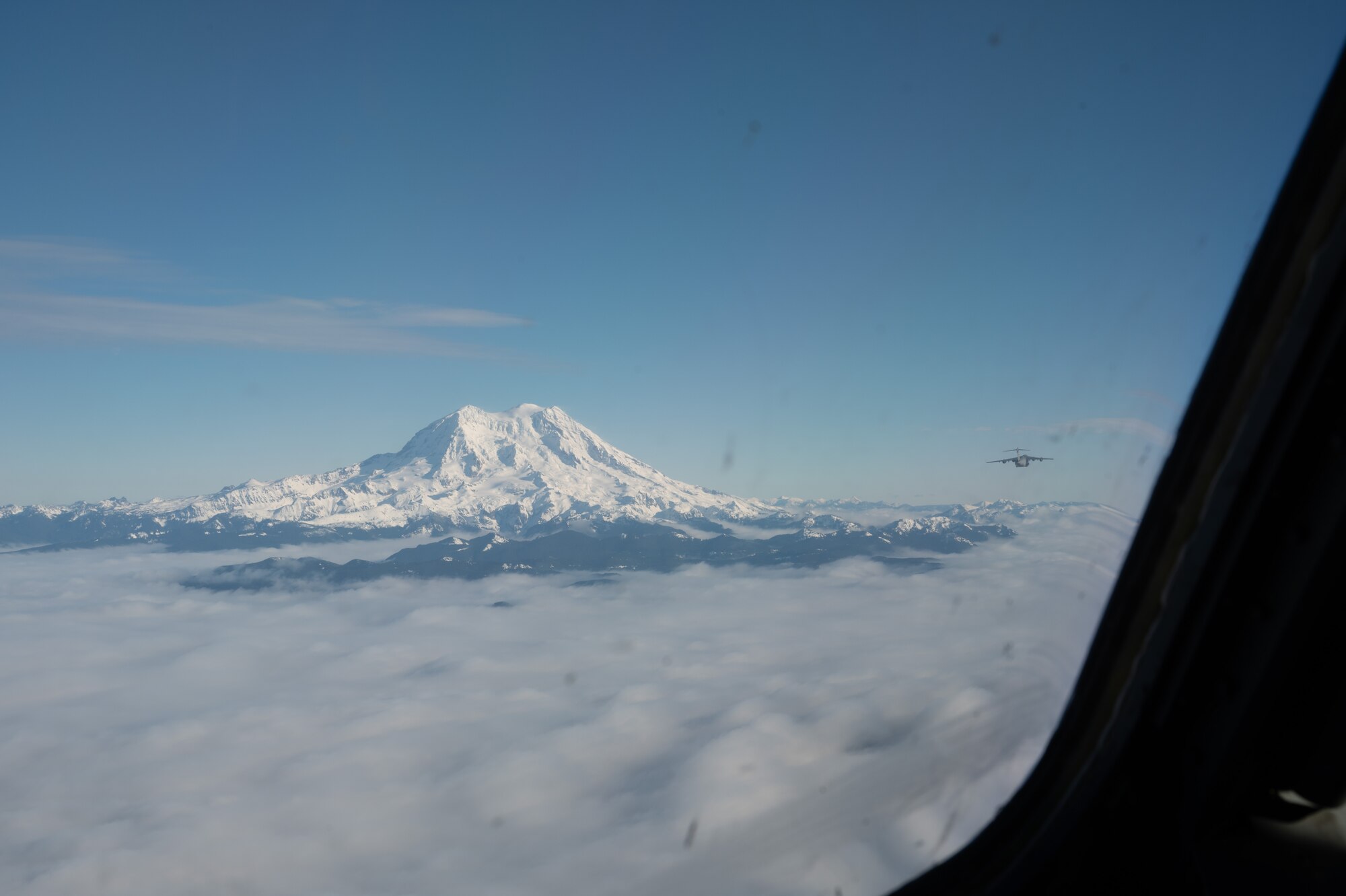 The 62d Airlift Wing executes a nine-ship C-17 Globemaster III formation from Joint Base Lewis-McChord, Wash., Jan. 8, 2025. The exercise demonstrated the wing's rapid global mobility capabilities, including precise airdrop operations and synchronized departures, highlighting the readiness and skill of aircrew and maintainers in supporting U.S. and allied missions worldwide.