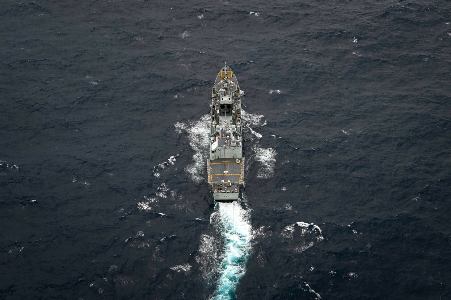 His Majesty’s Canadian Ship Ottawa sails in international waters during flight operations with Griffin, the ship’s embarked CH-148 helicopter during exercise Noble Wolverine in the South China Sea on 11 January 2025. Photo Credit: Sailor 3rd Class Jacob Saunders, Canadian Armed Forces Photo.