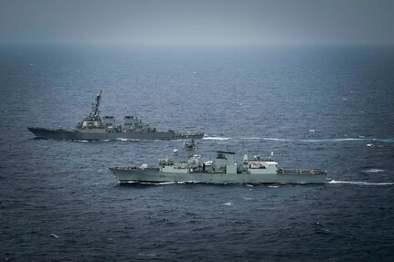 United States Ship Higgins (DDG76) and His Majesty’s Canadian Ship Ottawa conduct manoeuvers in international waters during exercise Noble Wolverine in the South China Sea on 11 January 2025. Photo Credit: Sailor 3rd Class Jacob Saunders, Canadian Armed Forces Photo.