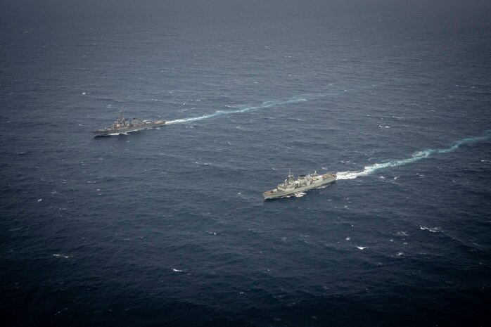United States Ship Higgins (DDG76) and His Majesty’s Canadian Ship Ottawa conduct manoeuvers in international waters during exercise Noble Wolverine in the South China Sea on 11 January 2025. Photo Credit: Sailor 3rd Class Jacob Saunders, Canadian Armed Forces Photo.