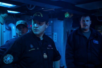 250109-N-HT008-1230 SOUTH CHINA SEA (Jan. 9, 2025) Royal Canadian Navy Lt. Jonathan Boerger, a communication and information systems officer aboard the Royal Canadian Navy Halifax-class frigate HMCS Ottawa (FFH 341), speaks with the crew aboard the Arleigh Burke-class guided-missile destroyer USS Higgins (DDG 76) during a bilateral exercise in the South China Sea, Jan. 9. Higgins is forward-deployed and assigned to Destroyer Squadron (DESRON) 15, the Navy’s largest DESRON and the U.S. 7th Fleet’s principal surface force. (U.S. Navy photo by Mass Communication Specialist 3rd Class Trevor Hale)