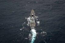 His Majesty’s Canadian Ship Ottawa sails in international waters during flight operations with Griffin, the ship’s embarked CH-148 helicopter during exercise Noble Wolverine in the South China Sea on 11 January 2025. Photo Credit: Sailor 3rd Class Jacob Saunders, Canadian Armed Forces Photo.