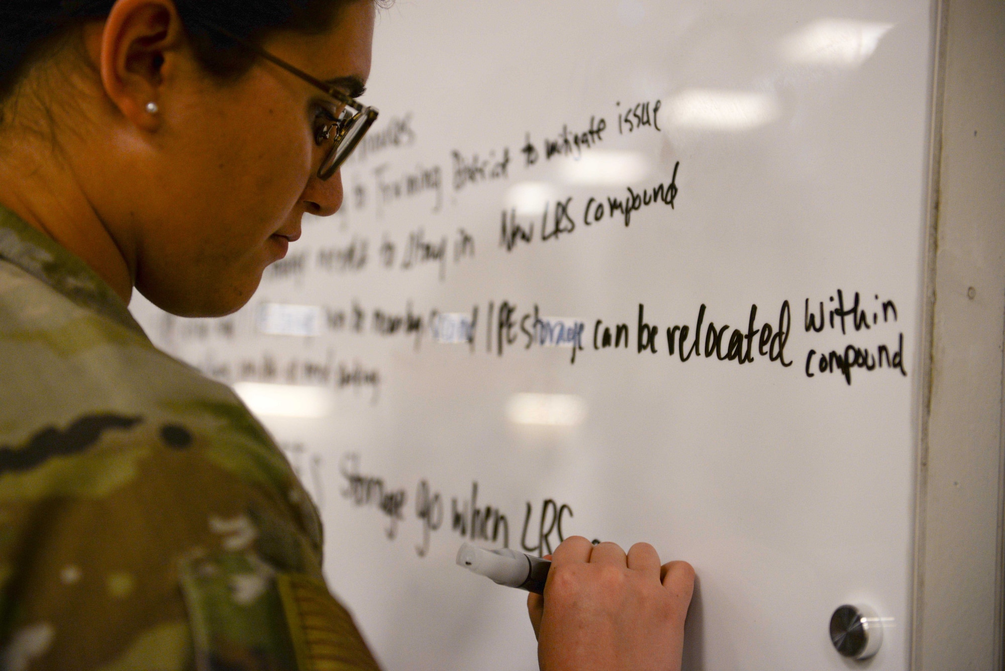 U.S. Air Force 1st Lt. Xiomara Roberge, 51st Civil Engineer Squadron program development officer, consolidates stakeholder suggestions during the Osan Planning Charrette at Osan Air Base, Republic of Korea, Jan. 7, 2025. A planning charrette shrinks the time it takes to brainstorm, troubleshoot, deconflict, and organize ideas and inputs around what infrastructure decisions will best suit the needs of the future of a base. The 51st CES hosted the event to decrease the amount of time it would typically take to create a 10-year installation development plan. (U.S. Air Force photo by Staff. Sgt. Kahdija Slaughter)
