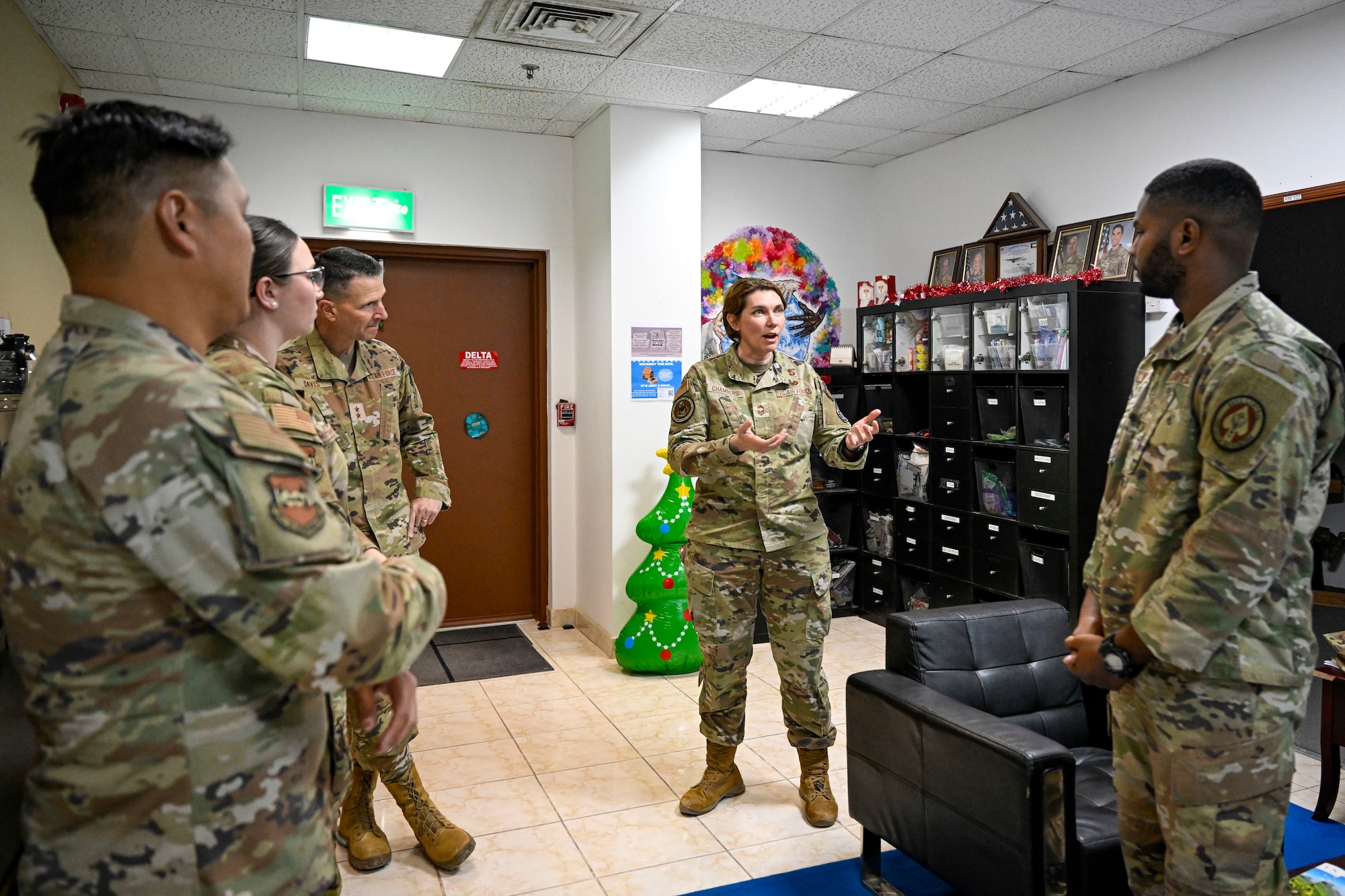 A U.S. Air Force Airman speaks to a group of Airmen.