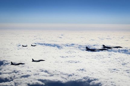 Two U.S. B-1B Lancers are escorted by two Republic of Korea Air Force F-15Ks Slam Eagles and two Japan Air Self-Defense Force Mitsubishi F-2s in airspace between South Korea and Japan, Jan. 15, 2025.