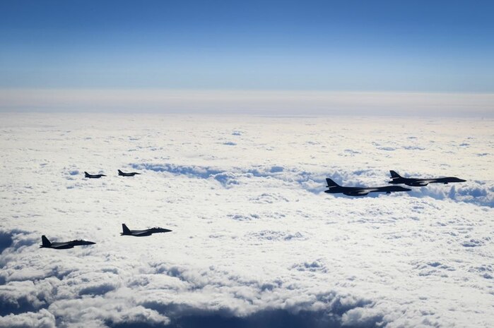 Two U.S. B-1B Lancers are escorted by two Republic of Korea Air Force F-15Ks Slam Eagles and two Japan Air Self-Defense Force Mitsubishi F-2s in airspace between South Korea and Japan, Jan. 15, 2025.