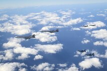 Two U.S. B-1B Lancers are escorted by two Republic of Korea Air Force F-15Ks Slam Eagles and two Japan Air Self-Defense Force Mitsubishi F-2s in airspace between South Korea and Japan, Jan. 15, 2025.