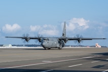 C-130 taxis on the flightline
