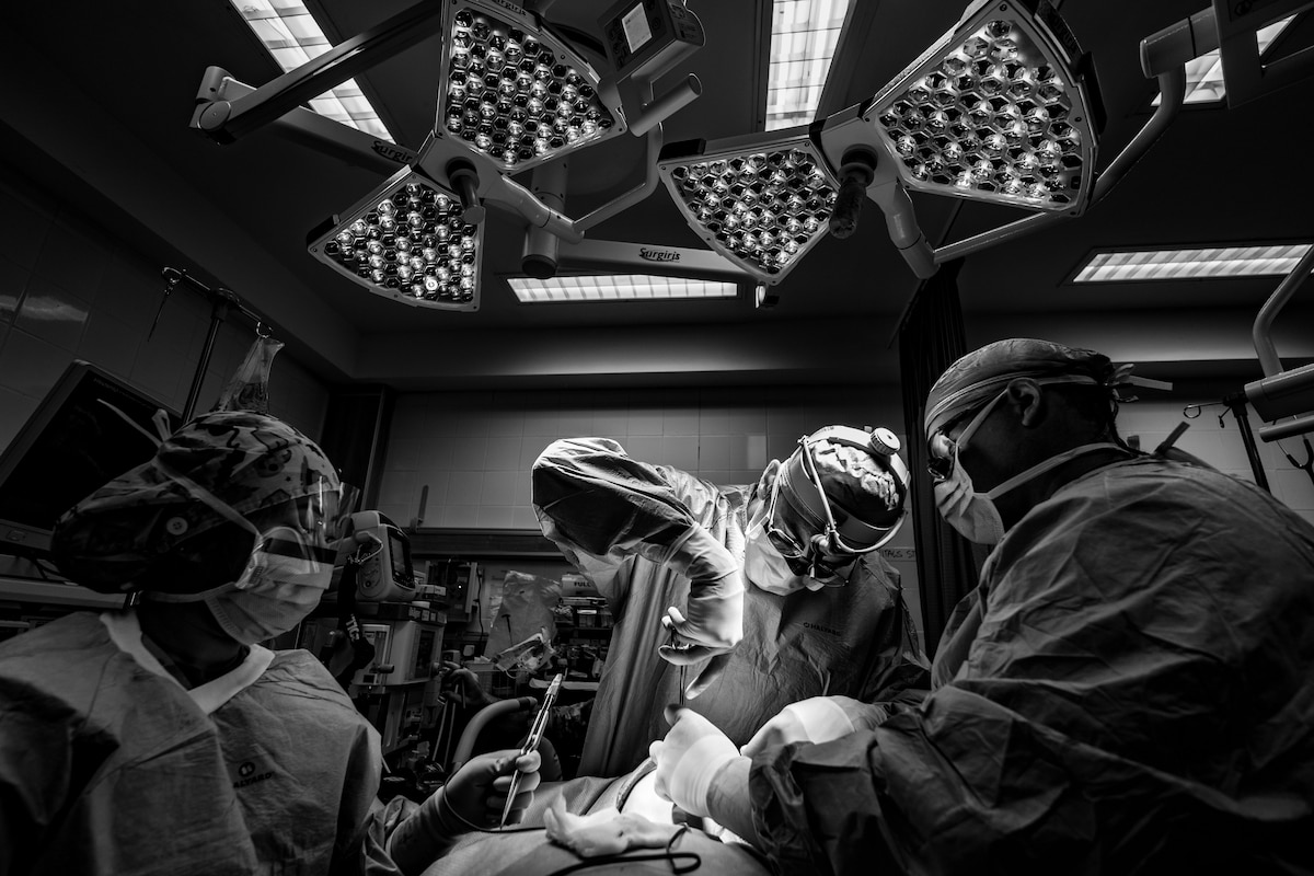 Surgeons perform surgery