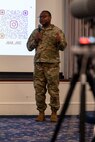 U.S. Air Force Chief Master Sgt. Clifford Lawton, senior enlisted leader of Joint Base Anacostia-Bolling and 11th Wing command chief, addresses attendees at a town hall meeting on Joint Base Anacostia-Bolling, Washington, D.C., Nov. 21, 2024. Lawton responded to questions from attendees in-person and virtually. (U.S. Air Force photo by Staff Sgt. Jordan Powell)