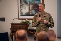 U.S. Air Force Col. Ryan A.F. Crowley, commander of Joint Base Anacostia-Bolling and the 11th Wing, responds to questions at a town hall meeting on Joint Base Anacostia-Bolling, Washington, D.C., Nov. 21, 2024. Crowley answered questions pertaining to base housing policy and installation improvement needs. (U.S. Air Force photo by Staff Sgt. Jordan Powell)
