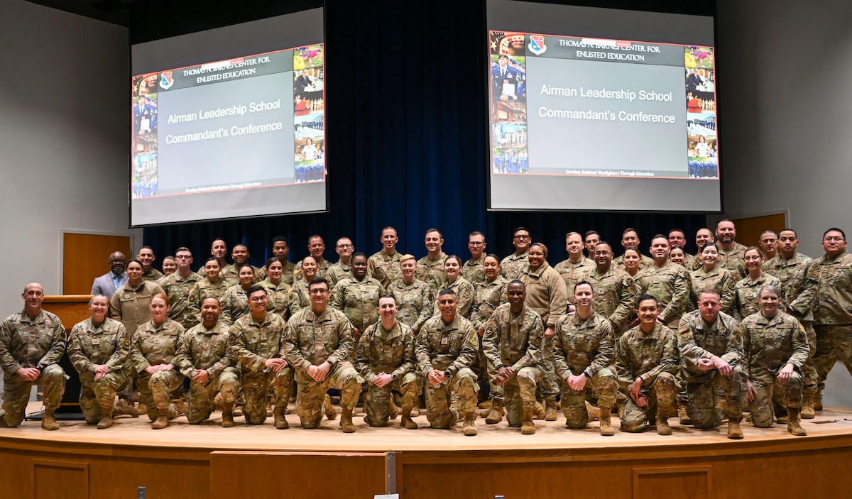 U.S. Air Force leaders in enlisted education pose inside of Spruance Hall at the I.G. Brown Training and Education Center, McGhee Tyson Air National Guard Base, Tennessee, Jan. 8, 2025. Airman Leadership School (ALS) commandants, senior leaders from the Barnes Center for Enlisted Education, and representatives from the Lankford Center for Enlisted Professional Military Education attend the inaugural ALS Commandant's Conference to share strategies and best practices to develop the next generation of Total Force enlisted leaders.