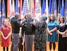 From left to right: Chief of Staff of the Army Gen. Randy George and Stacy Davis pin Maj. Gen. Johnny Davis, U.S. Army Recruiting Command commanding general, with his third star promoting him to lieutenant general. Stacy is the wife of Lt. Gen. Davis.