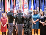 Chief of Staff of the Army Gen. Randy George and Stacy Davis pin Maj. Gen. Johnny Davis, U.S. Army Recruiting Command commanding general, with his third star promoting him to lieutenant general. Stacy is the wife of Lt. Gen. Davis.