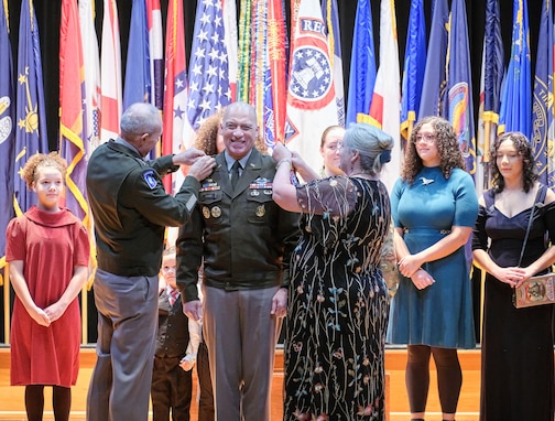 Chief of Staff of the Army Gen. Randy George and Stacy Davis pin Maj. Gen. Johnny Davis, U.S. Army Recruiting Command commanding general, with his third star promoting him to lieutenant general. Stacy is the wife of Lt. Gen. Davis.