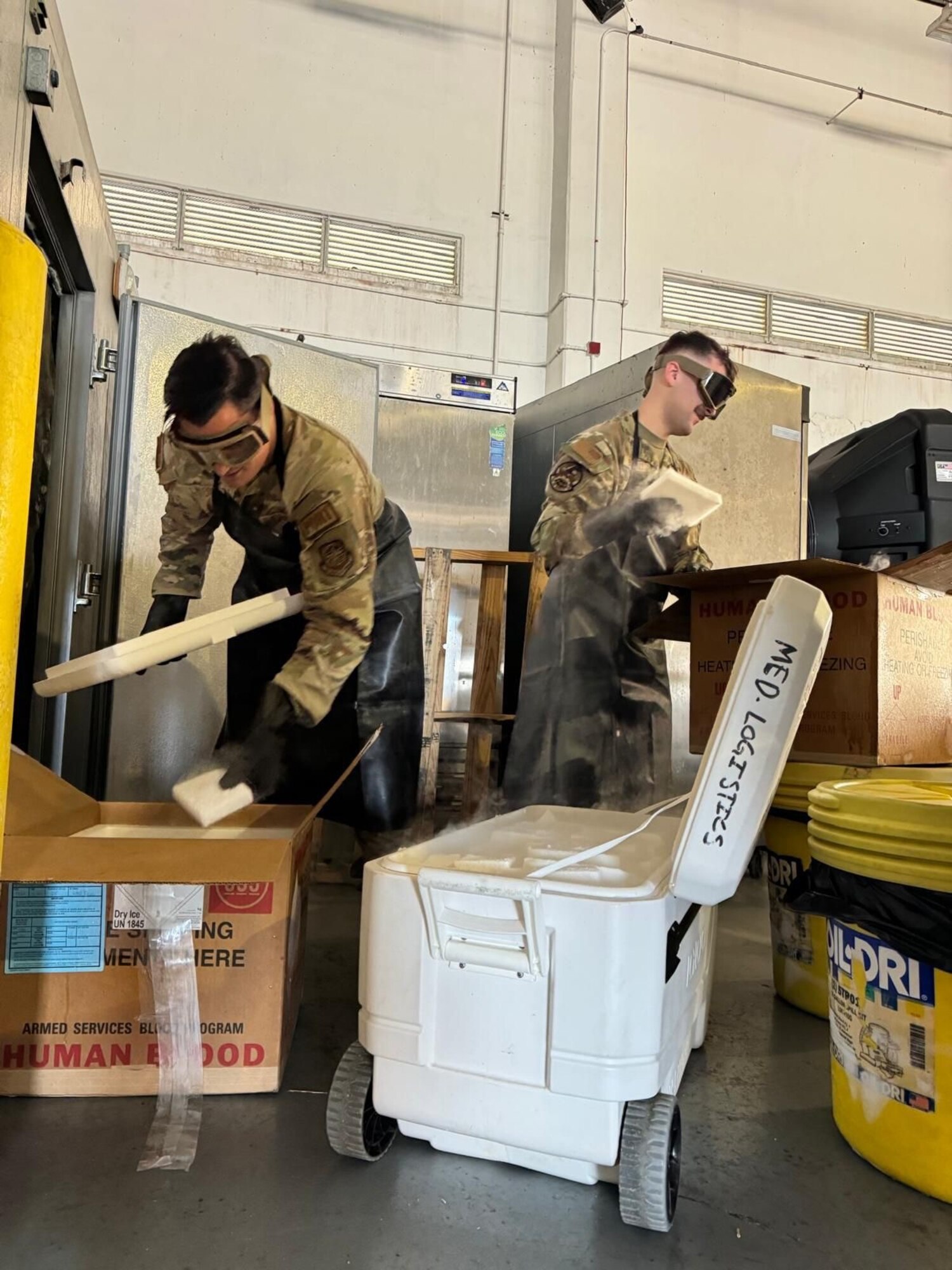 Airmen assigned to the 734th Air Mobility Squadron work to save a critical blood supply en route to South Korea at Andersen Air Force Base, Guam, Jan. 9, 2025. After a Boeing 747 was unexpectedly grounded, Airmen assigned to the 36th Medical Group and 734 AMS teamed up to secure 400 pounds of dry ice to maintain the temperature of 18 boxes of blood and plasma en route to South Korea.