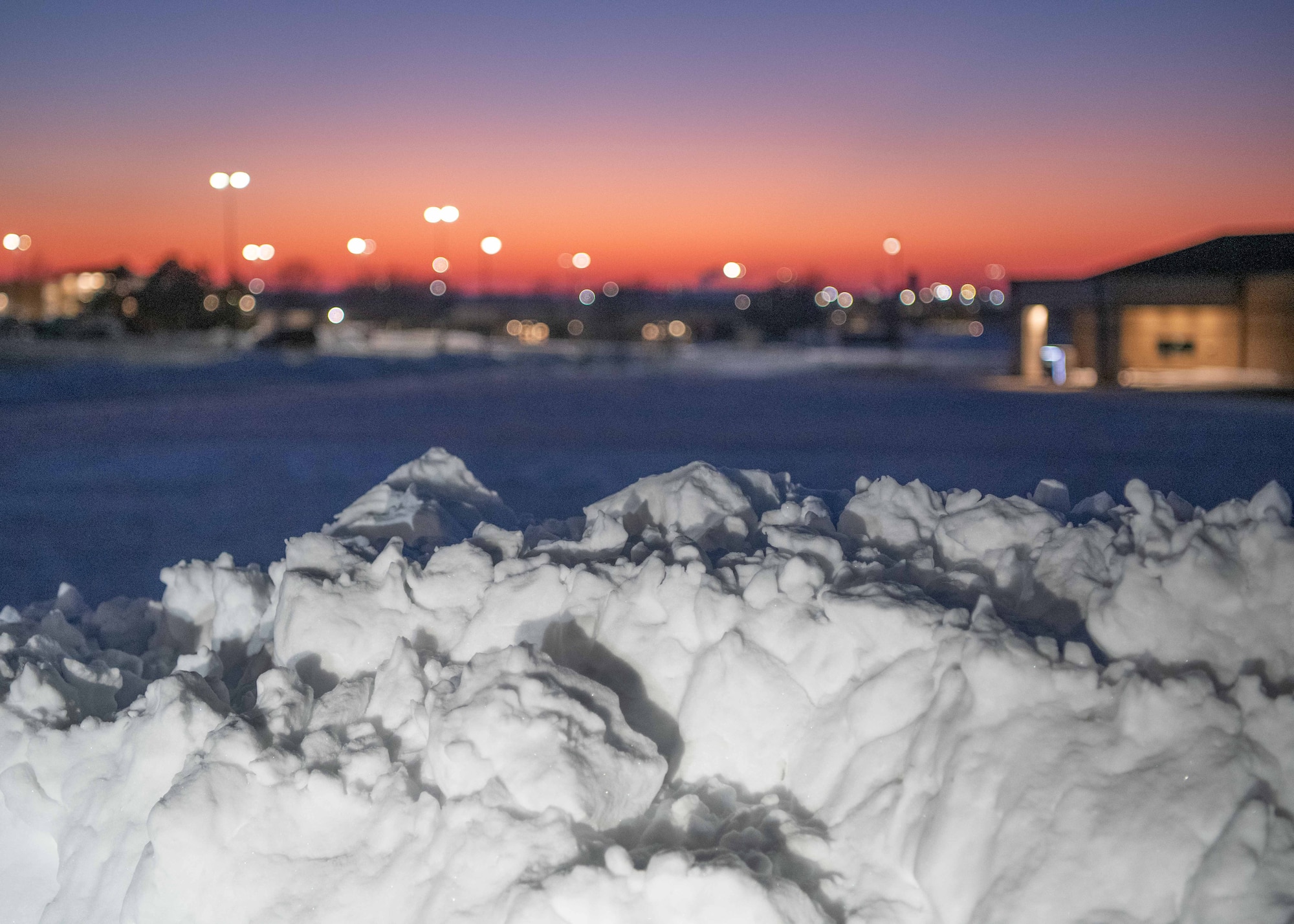 A pile of snow builds up at McConnell Air Force Base, Kansas, Jan. 8, 2025. Over the course of five days, approximately nine inches of snowfall covered the surrounding area of Sedgwick County. (U.S. Air Force photo by Airman 1st Class Patrick O'Neill)