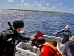 U.S. Coast Guard Forces Micronesia/Sector Guam personnel, supported by Maritime Safety and Security Team (MSST) San Francisco, conduct recreational boating safety exams with CNMI's Department of Public Safety off Saipan, CNMI, on Dec. 4, 2024.