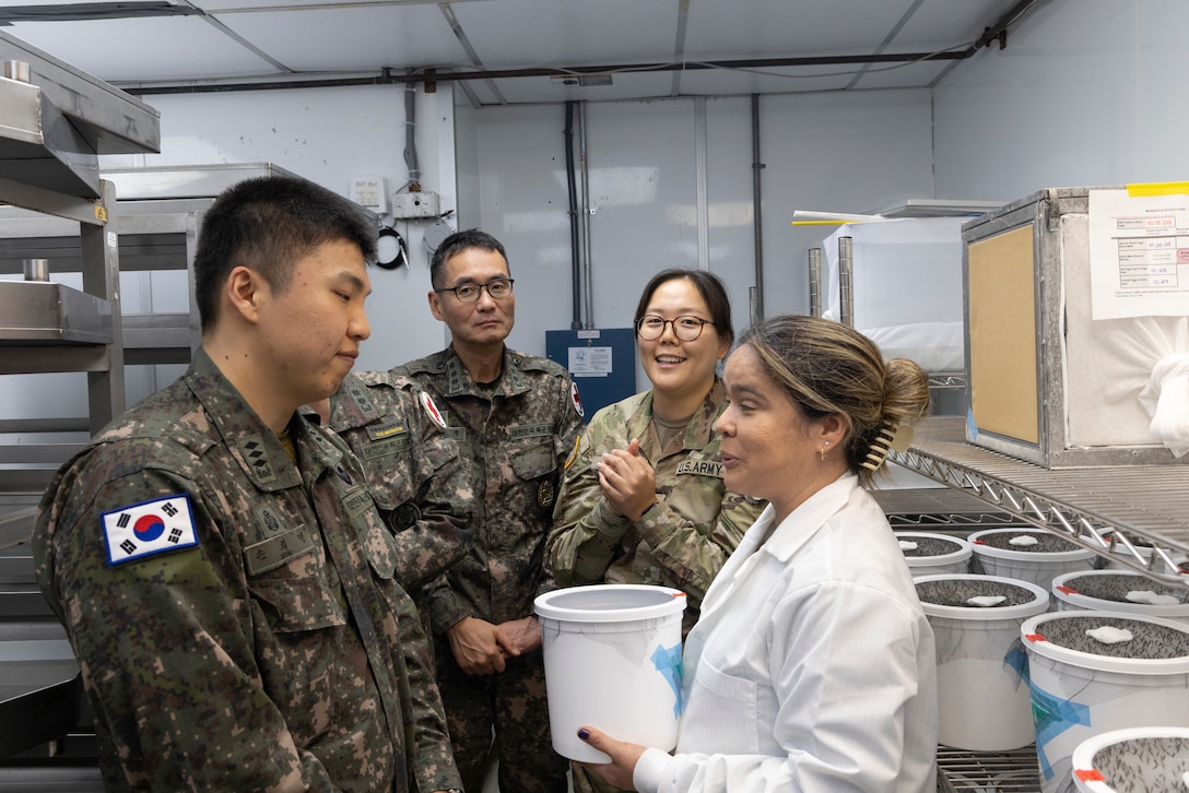 Delegates of the Republic of Korea visited WRAIR and stopped by the Insectary to learn more about the working being done by the Entomology branch.