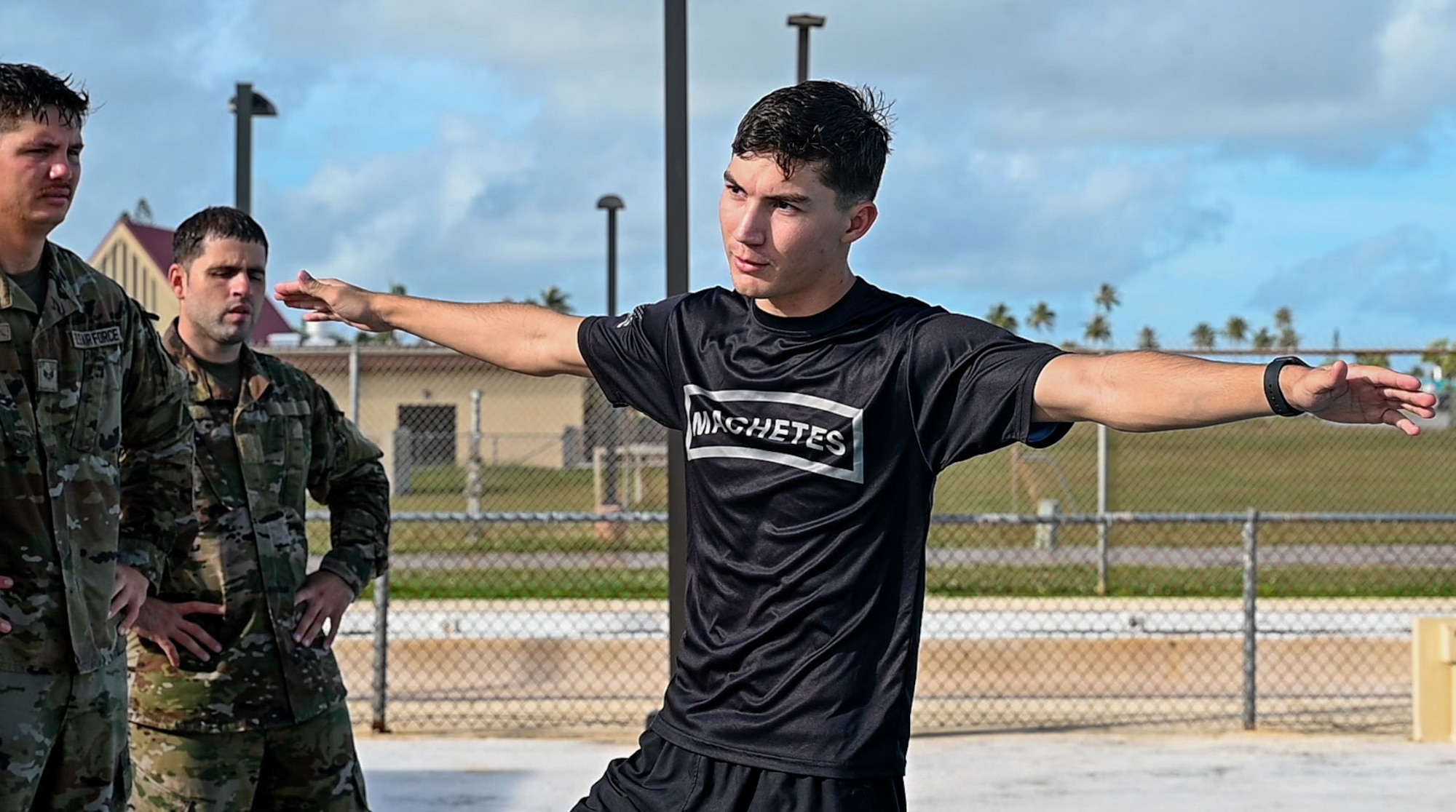 Leadership from the 36th Contingency Response Group, and 736th Security Forces Training Center instructors celebrate the Airmen that graduated the most recent jungle training course at Northwest Field, Andersen Air Force Base, Guam, Jan. 16, 2024. The course was designed to introduce Airmen to jungle specific obstacles and strategies in various ways.  (U.S. Air Force photo by Airmen 1st Class Manasseh Demissie)