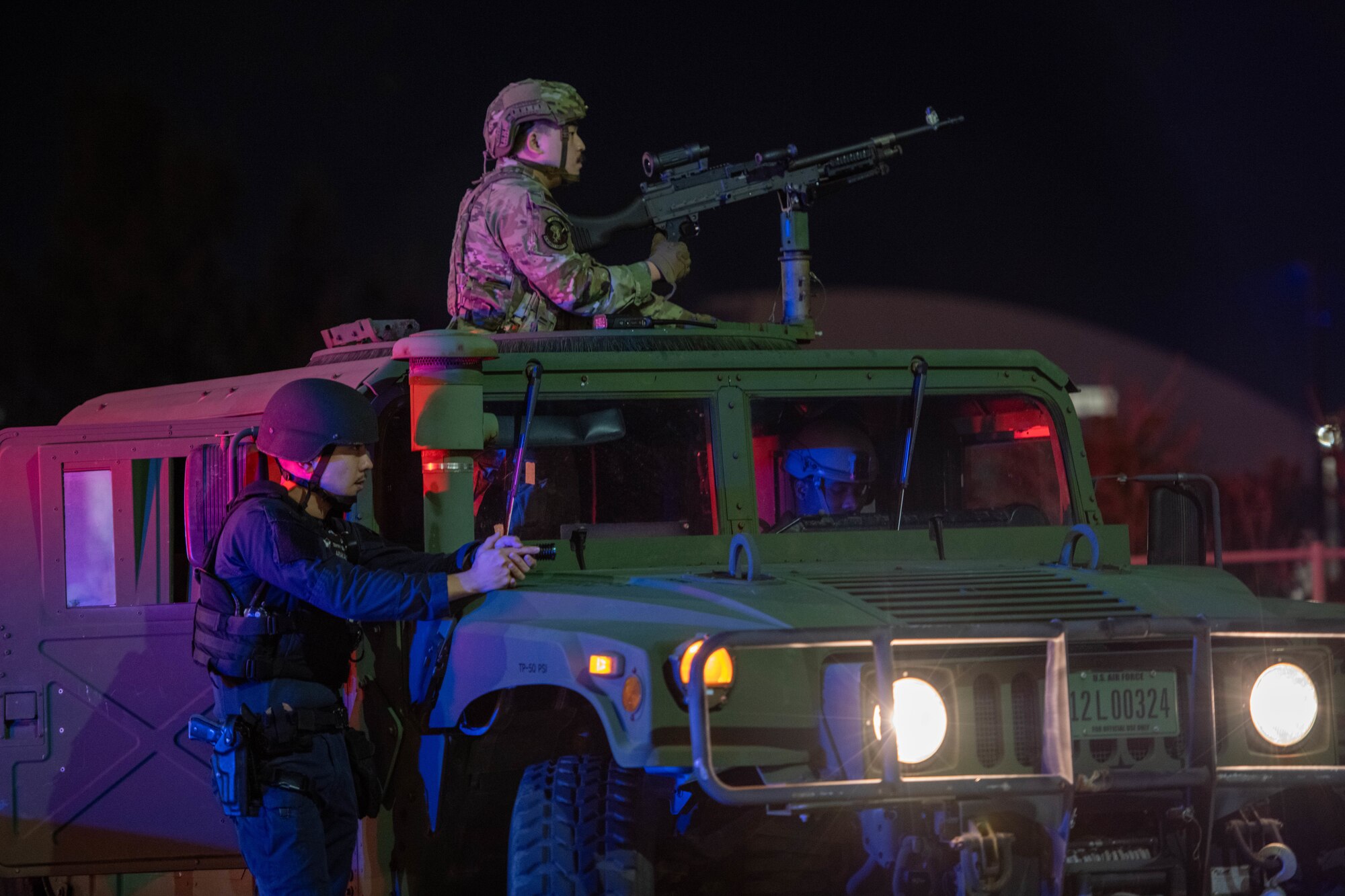 Service member and civilian participate in exercise.