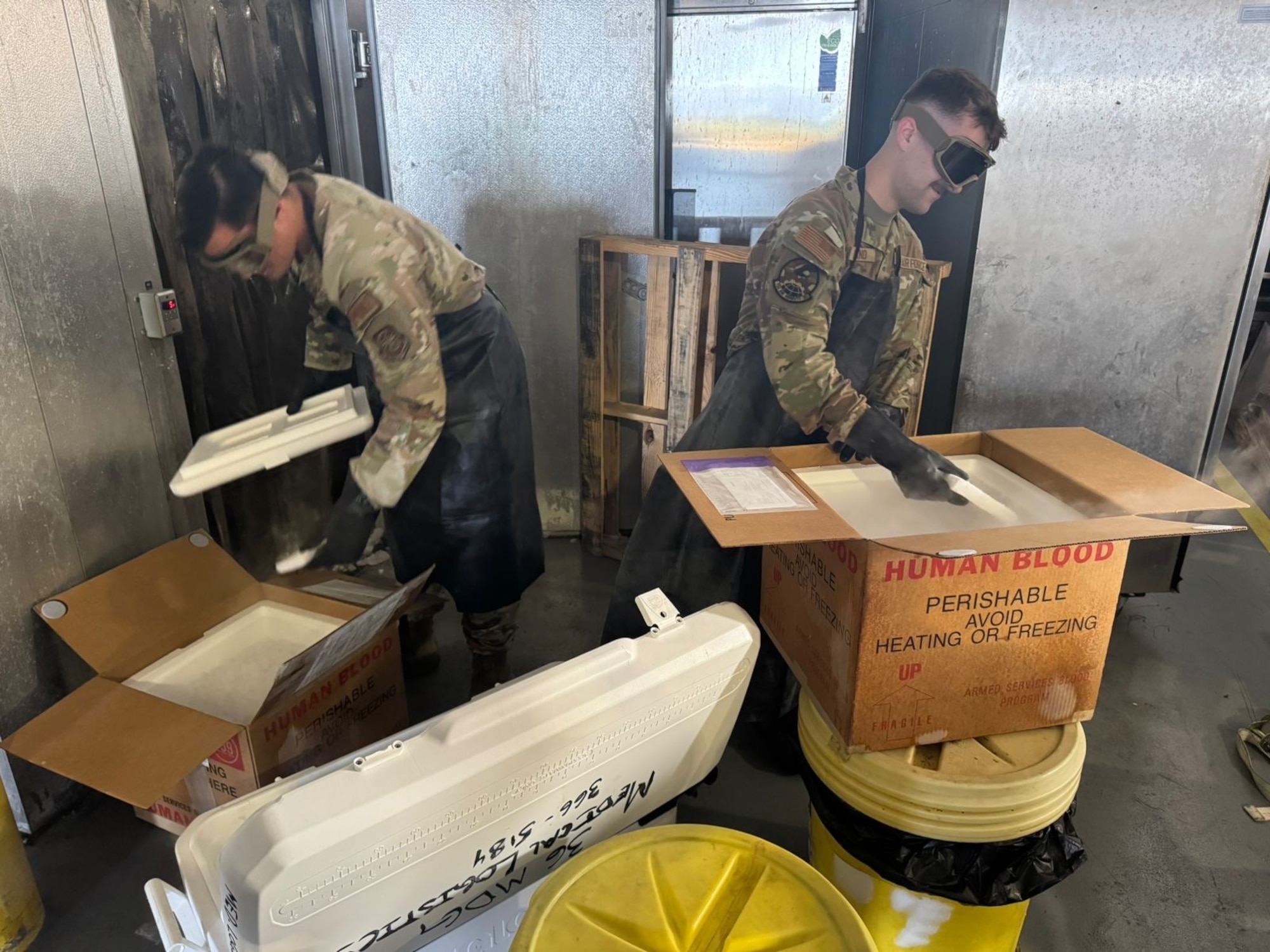 Airmen assigned to the 734th Air Mobility Squadron work to save a critical blood supply en route to South Korea at Andersen Air Force Base, Guam, Jan. 9, 2025. After a Boeing 747 was unexpectedly grounded, Airmen assigned to the 36th Medical Group and 734 AMS teamed up to secure 400 pounds of dry ice to maintain the temperature of 18 boxes of blood and plasma en route to South Korea.