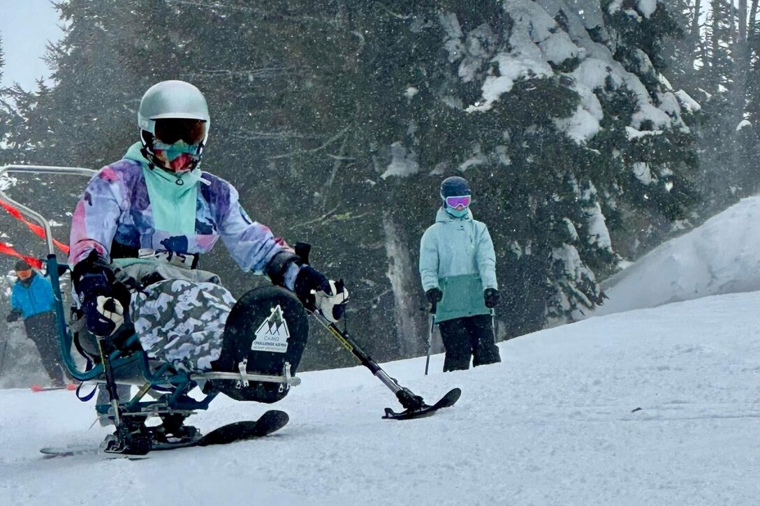 Ret. Army Maj. Mary Porter Sit-skiing in Colorado.