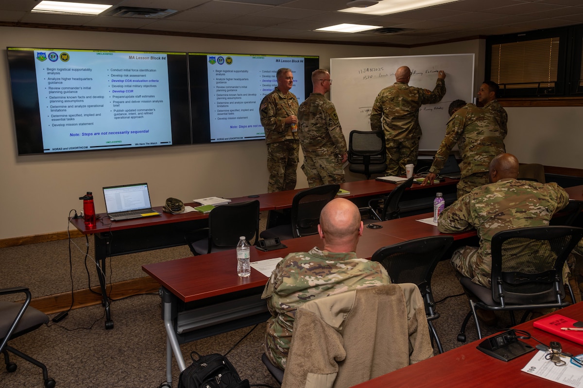 New Jersey National Guard members participate in a simulated training event during a Joint Staff training course conducted by North American Aerospace Defense Command and U.S. Northern Command at the NJNG Joint Operations Center in Lawrenceville, New Jersey, Jan. 12​​, 2025. The Joint Staff training course ​focused on the readiness of Citizen-Soldiers and -Airmen to support emergency management in New Jersey and beyond.