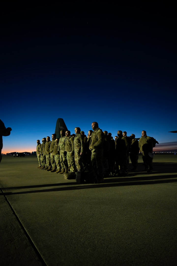 Oklahoma National Guard Soldiers receive a briefing prior to their departure from Will Rogers Air National Guard Base in Oklahoma City,  Jan 16, 2025. The Oklahoma Guardsmen join nearly 8,000 National Guard Soldiers and Airmen from approximately 40 states and territories to augment the District of Columbia National Guard. With a long-standing tradition of supporting presidential inaugurations, the National Guard plays a crucial role in balancing safety, security, and other duties during the peaceful transition of power (Oklahoma National Guard Photo by 1st Sgt. Mireille Merilice-Roberts).