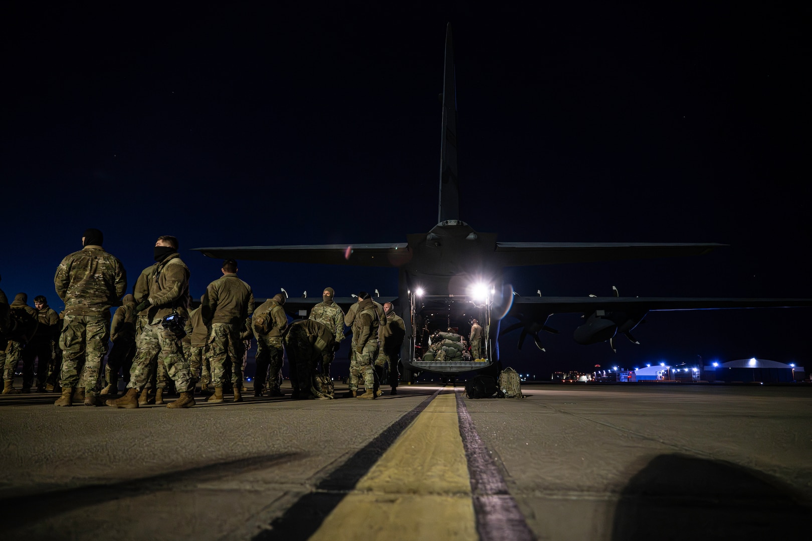 Oklahoma National Guard Soldiers prepare to depart from Will Rogers Air National Guard Base in Oklahoma City, Jan 16, 2025. The Oklahoma Guardsmen join nearly 8,000 National Guard Soldiers and Airmen from approximately 40 states and territories to augment the District of Columbia National Guard. With a long-standing tradition of supporting presidential inaugurations, the National Guard plays a crucial role in balancing safety, security, and other duties during the peaceful transition of power (Oklahoma National Guard Photo by 1st Sgt. Mireille Merilice-Roberts).