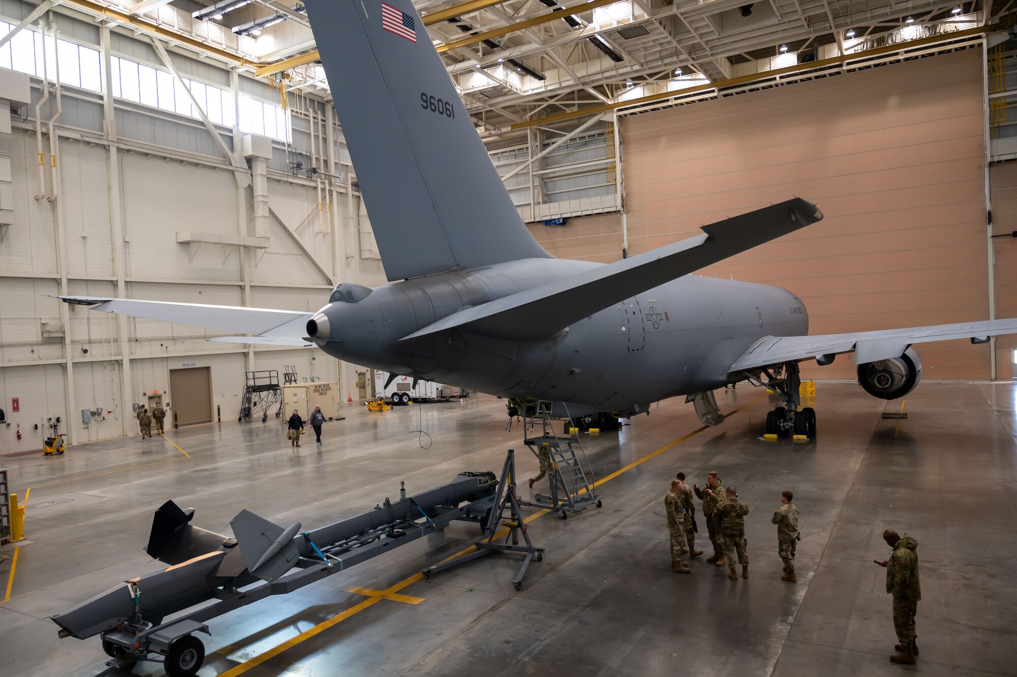 A KC-46A Pegasus aircraft sits in a hangar awaiting repair to its boom gimbal by members of the 605th Aircraft Maintenance Squadron at Joint Base McGuire-Dix-Lakehurst, N.J., Jan. 14, 2025. The 605th AMXS is responsible for flight line maintenance, inspection and repair efforts that keep the KC-46A flying and ready to perform its mission. (U.S. Air Force photo by Susan Moriarty)