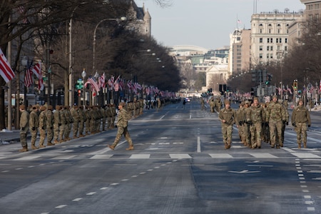 Airmen march into cordon position