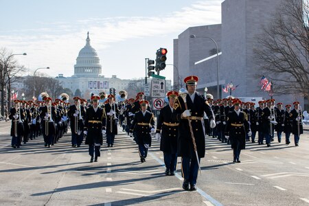 The U.S. Army Band "Pershing's Own" marches with U.S. Capitol in the background