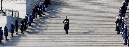Service member standing on stairs at U.S. Capitol