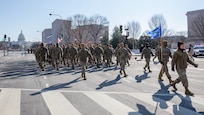 Airmen walking in formation