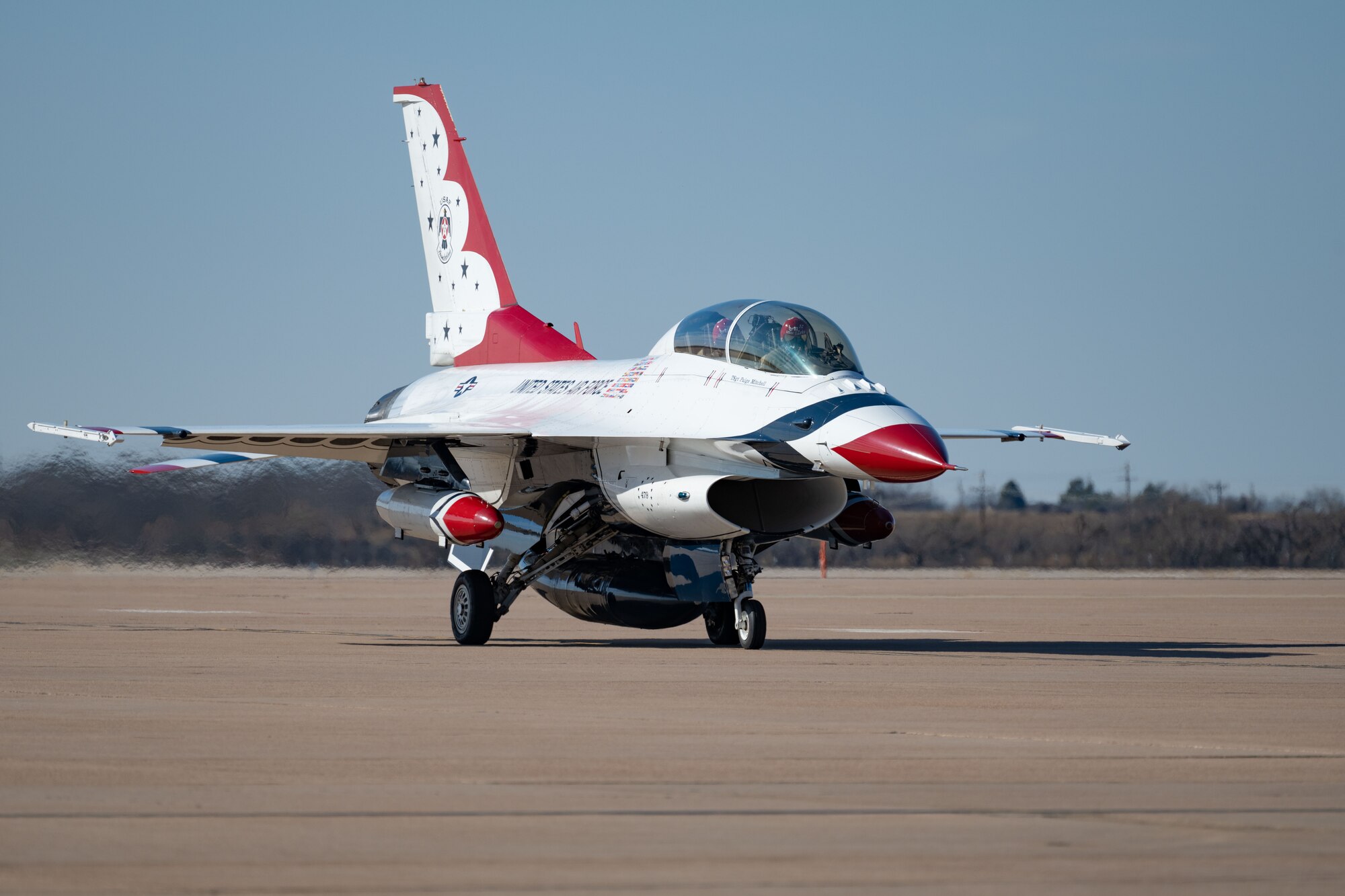 A F-16 Fighting Falcon assigned to the United States Air Force Air Demonstration Squadron "Thunderbirds" taxis on the flightline to complete a site survey for the upcoming airshow at Dyess Air Force Base, Texas, Jan. 15, 2024. The airshow is one example of Dyess’ commitment to maintaining its strong relationship with Abilene and the Big Country. (U.S. Air Force photo by Senior Airman Emma Anderson)