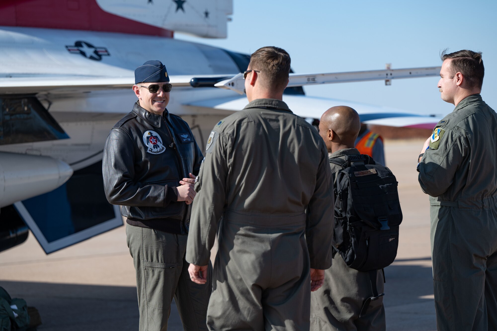 U.S. Air Force Maj. Zachary Taylor, USAF Thunderbirds, Thunderbird 32, meets Dyess Air Force Base aircrew members to complete a site survey for the upcoming airshow at Dyess AFB, Texas, Jan. 15, 2024. Dyess is hosting the “Wings Over West Texas” airshow on April 19 and 20 to celebrate West Texas heritage alongside the best of America’s Lift and Strike base. (U.S. Air Force Senior Airman Emma Anderson)