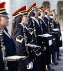 Soldiers lined up ready to play instruments